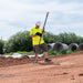 geo-FENNEL FGS 150-L Global Navigation Satellite System RTK Receiver on pole at a construction site 