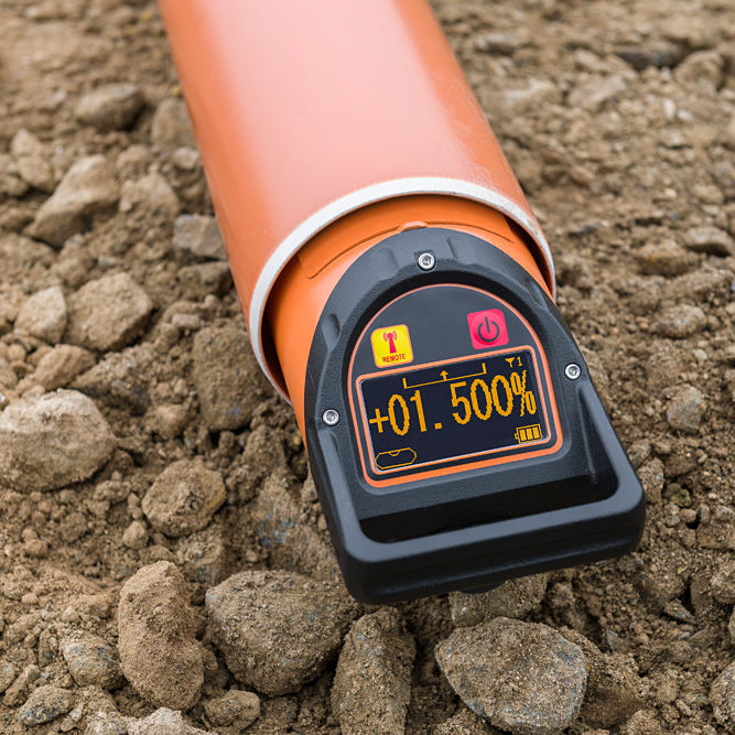 geo-FENNEL FKL 44 Red Beam Auto Tracking Pipe Laser Level in use at a construction site