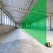 Geo Fennel FLG 245HV GREEN TRACKING Rotating Laser Level with FR 77mm Laser Receiver at a construction site with laser diagram
