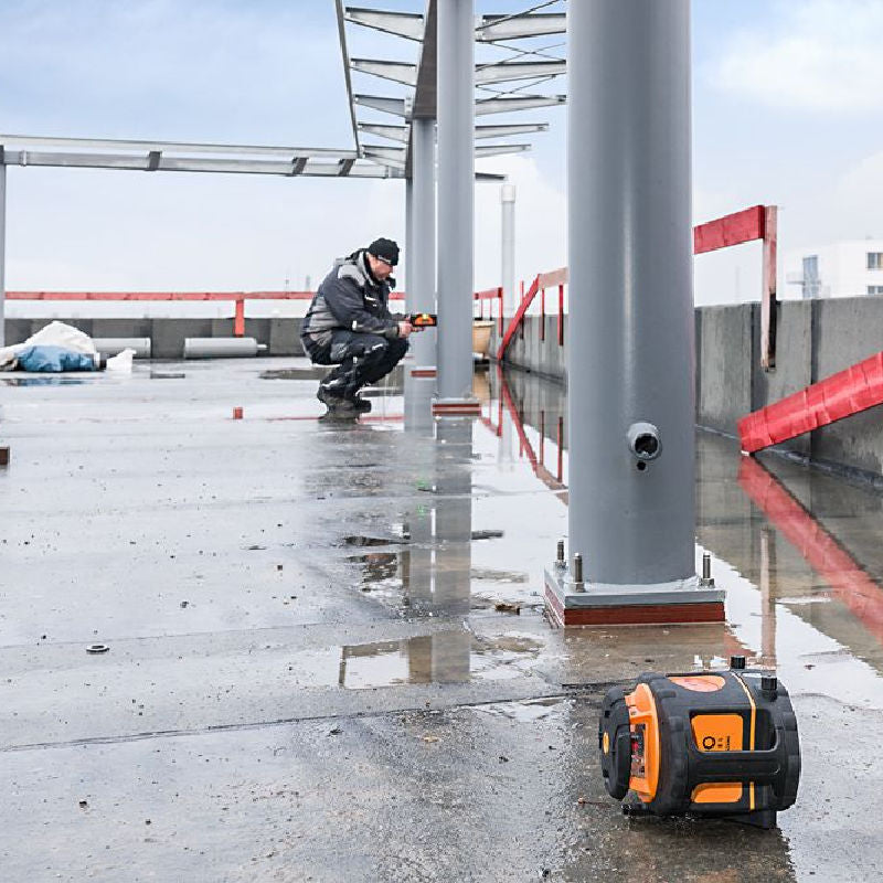 Geo Fennel FL275HV Tracking Rotating Laser Level on floor mount at a construction site