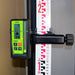 iMEX LRX 10 Laser Receiver attached to a leveling staff