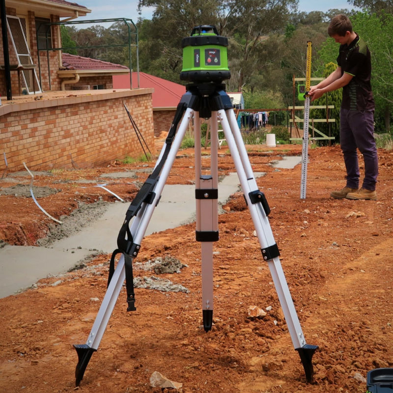 iMEX E60 Laser Level on Tripod at a Construction Site